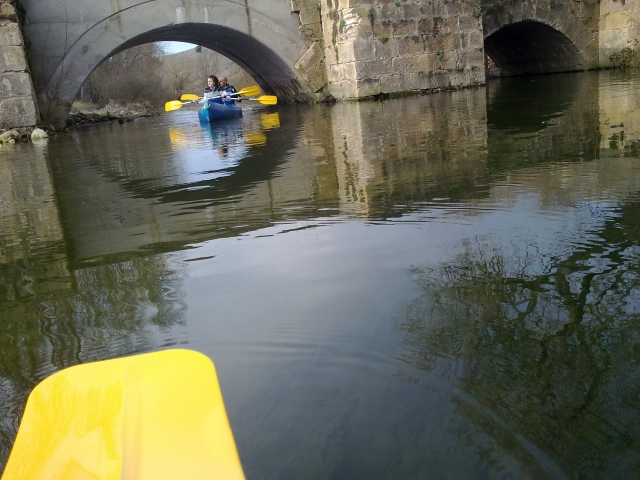  In a canoe under the bridge